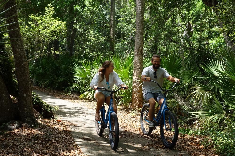 Couple biking in Flagler Beach