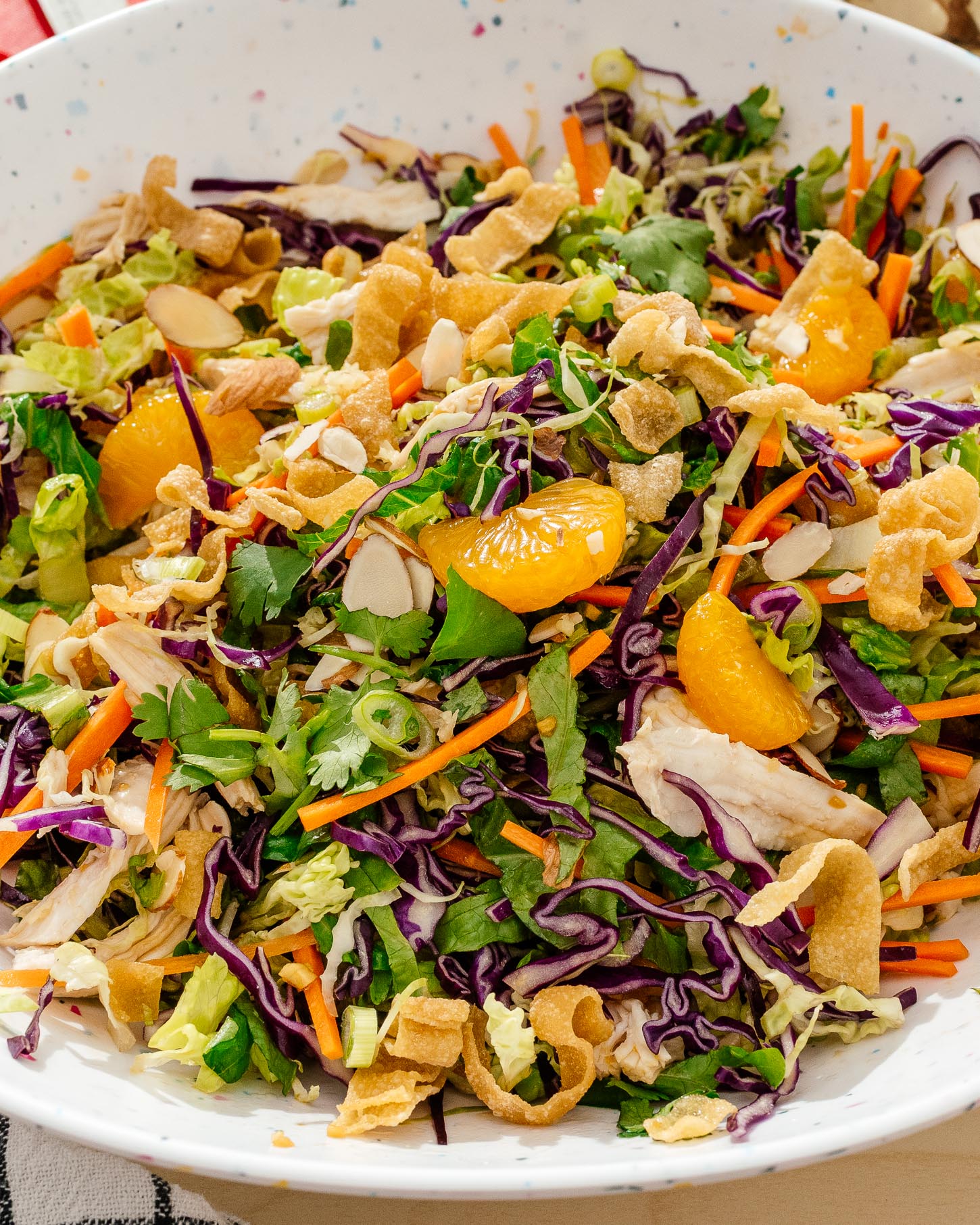tossing Chinese chicken salad | www.iamafoodblog.com