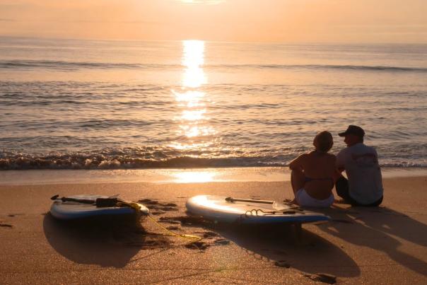 couple romance beach sunrise